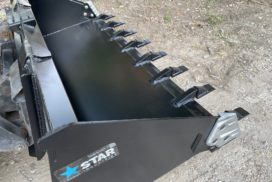 Top right view of Side Cutters on skid steer bucket