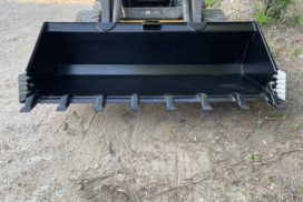Front view of Side Cutters on skid steer bucket