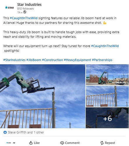 Forklift-mounted jib boom lifting materials on an active construction job site